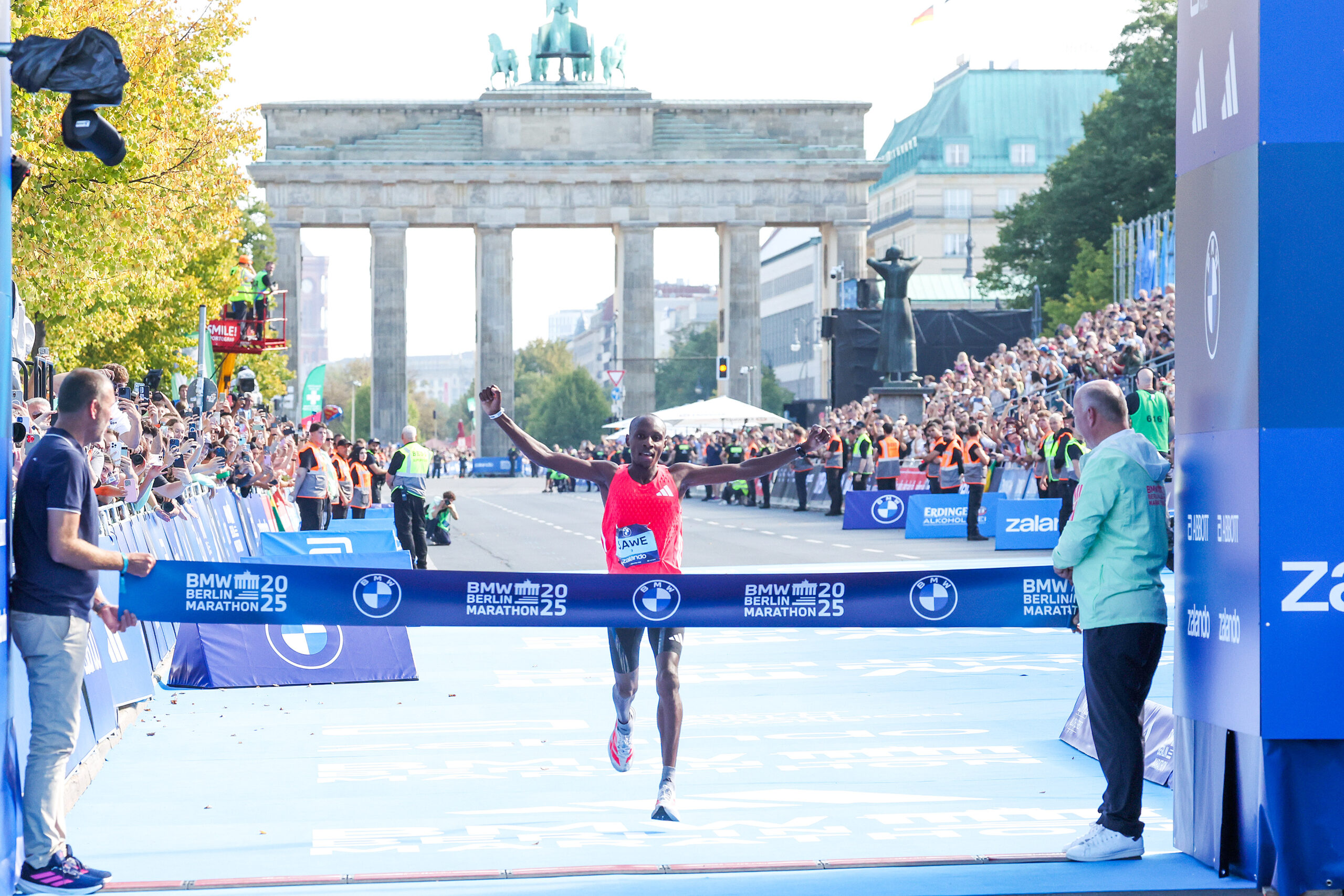 Berlin Marathon 2025 finish through the Brandenburg Gate on the world-record marathon course