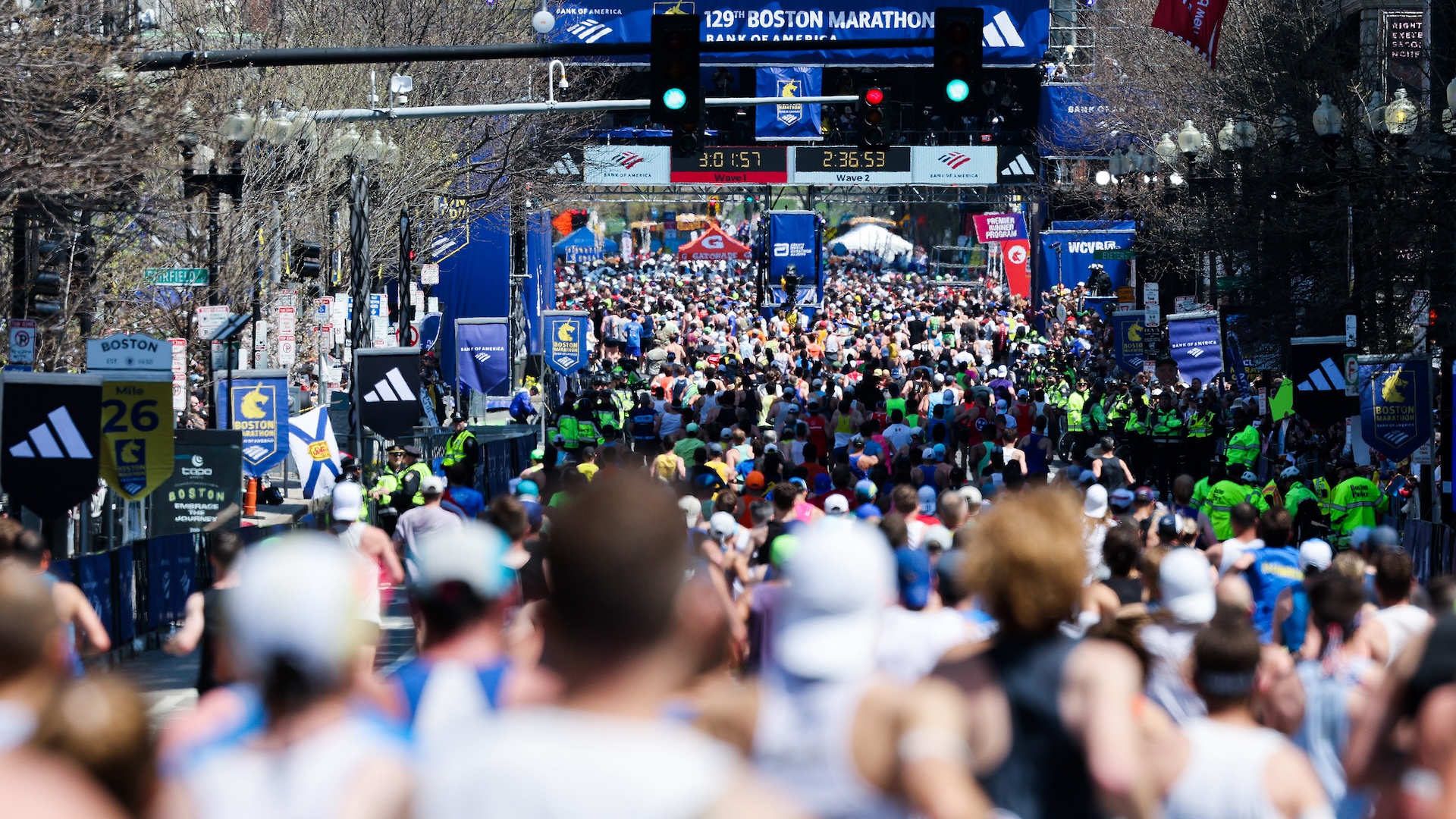 Boston Marathon 2025 spectators on Boylston Street cheering qualified runners on Patriots Day