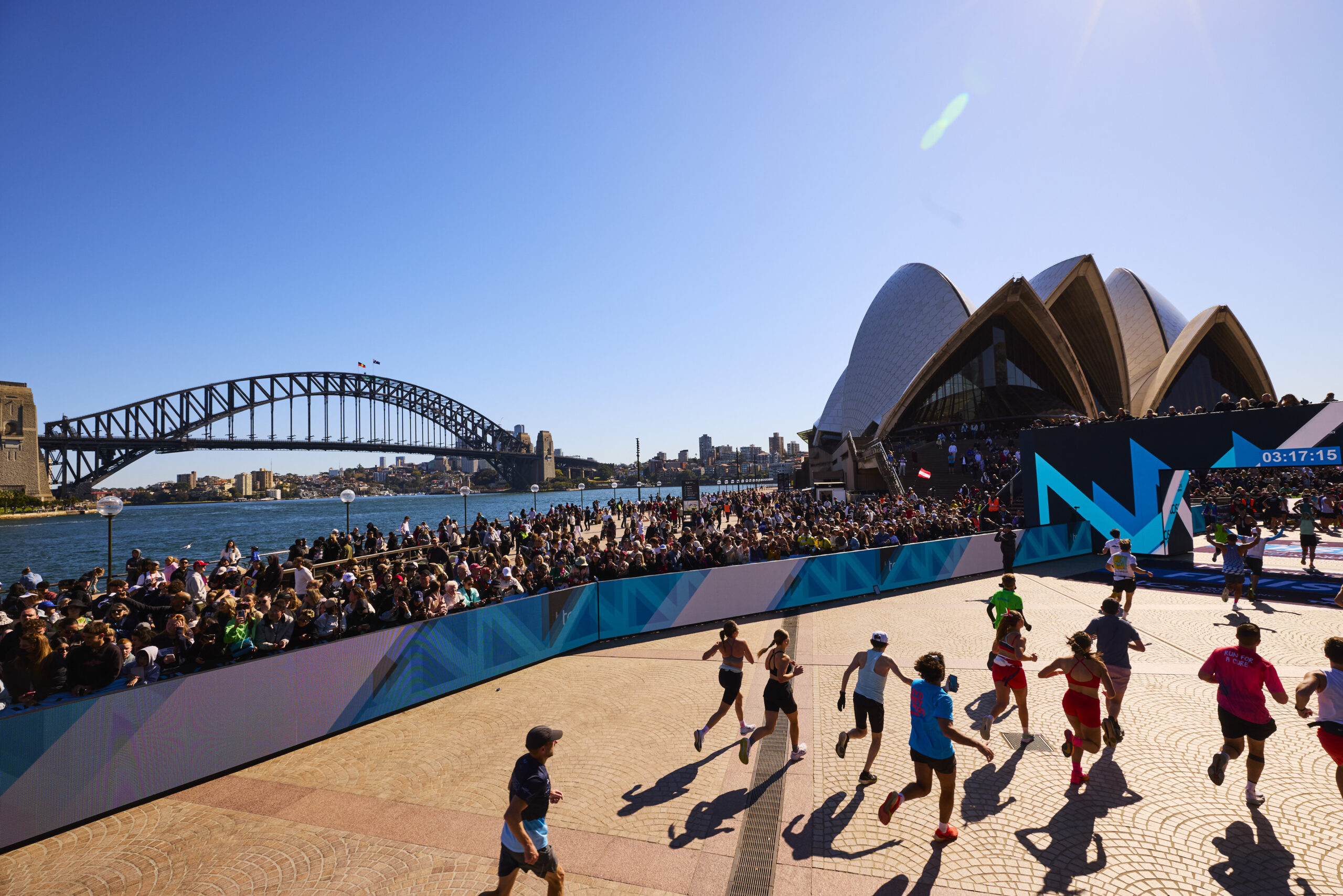 Sydney Marathon 2025 finish at the Opera House forecourt after crossing the Harbour Bridge
